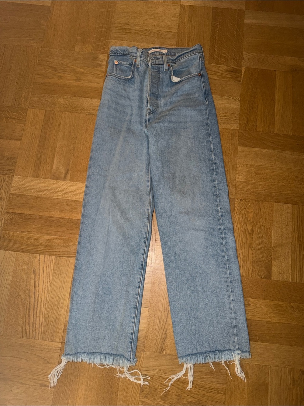 Levi's Light Blue High-Waist Straight Leg Jeans with Raw Hem